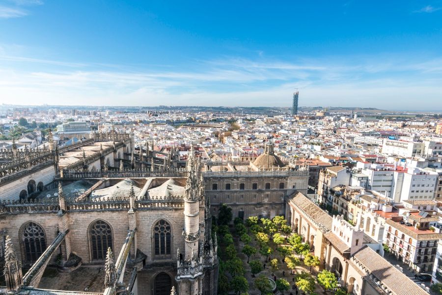 A photo of Seville, taken from up high, on a bright and sunny day.